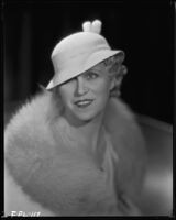 Peggy Hamilton modeling a felt hat with a small brim, 1933