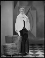 Peggy Hamilton modeling an ermine cape, 1930