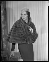 Actress Gail Patrick modeling a mink fur stole from Beckman's, 1933