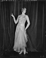 Peggy Hamilton modeling a dance frock decorated with bugle beads and rhinestones, 1930