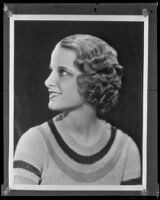 Actress Florine McKinney modeling a Weaver Jackson salon hairstyle, circa 1932-1933