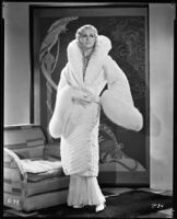 Peggy Hamilton modeling an ermine coat, 1931