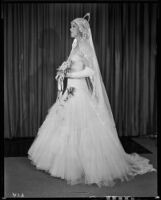 Peggy Hamilton modeling an Earl Luck wedding dress, 1931