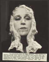 Peggy Hamilton modeling a velvet hat and long dress of chiffon velvet with Alençon lace, 1930