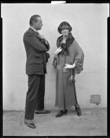 Peggy Hamilton modeling a loose-fitting dress with a fur collar and fur hat, [circa 1920?]