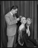 Peggy Hamilton modeling a headband with braided pearls, 1931