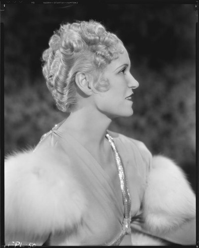 Peggy Hamilton modeling a formal coiffure hairstyle by Weaver Jackson's Salon, 1933