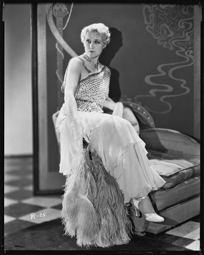 Peggy Hamilton modeling a chiffon evening gown, 1931