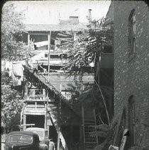Views of redevelopment sites showing the demolition of buildings in the district. These view date from 1959 to 1963. Specific sites are not identified in this set of images