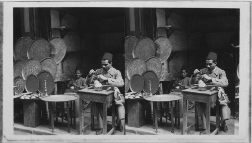 Egyptian Brass worker in his Booth, Old Cairo