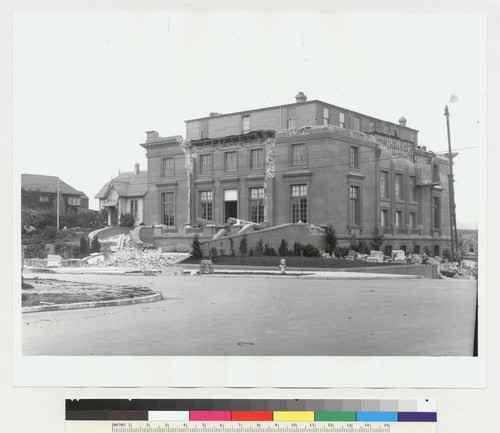 Northwest corner Maple & Washington Streets. [Damage to large masonry building.]