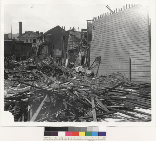 Old frame building Ninth and Brannan. Said to be earthquake damage with loss of life