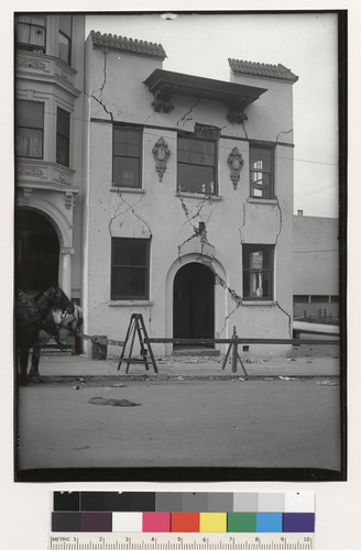 San Francisco plastered Brick House on 15th Street, at corner of Landers, looking east of North