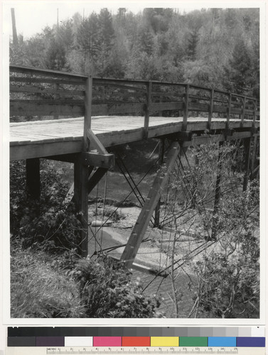 Bridge over south fork of Gualala River, 3 miles east of Stewart's Point. Looking north from south bank. Bridge floor &