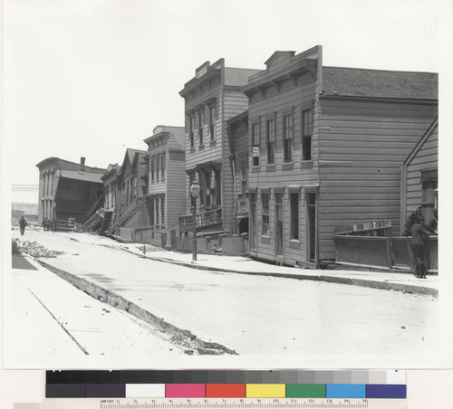 Ninth and Brannan Streets, San Francisco. (2 views of apparently same street, damage to rail lines and cobbled street.)