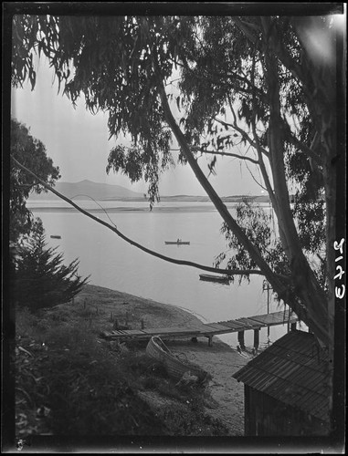 View towards narrow dock and three small boats, Morro Bay, 1929