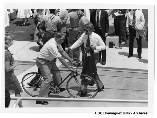 President Gerth on bicycle