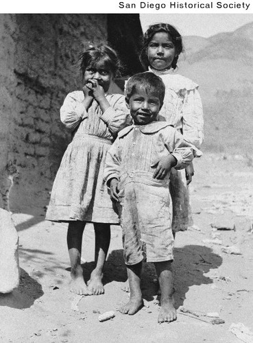 Pauma Indians Polaria, Inez, and Damien Pachito standing outside