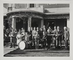 Frederic Theroux and orchestra posing with Luther Burbank