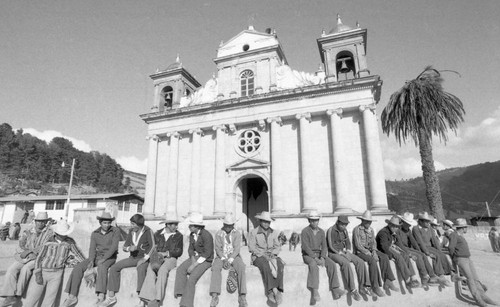 Mayan men in front of Parish Nahualá, 1982