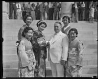 Miss Lil Tokio Alice Watanabe extends an invitation to Mayor Frank L. Shaw for the Nisei festival, Los Angeles, 1935