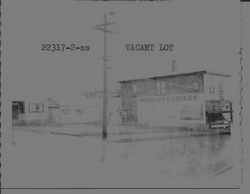 Vacant lot next to Spooner's Grocery at 108 Bodega Avenue behind the Crawford Building in Sebastopol, 1950s