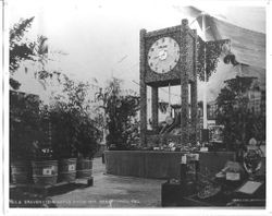 1913 Gravenstein Apple Show display of large pendulum clock made of whole and dried apples