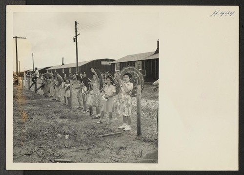 Closing of the Jerome Center, Denson, Arkansas. Evacuees still remaining in the Jerome Center wave to friends on the train
