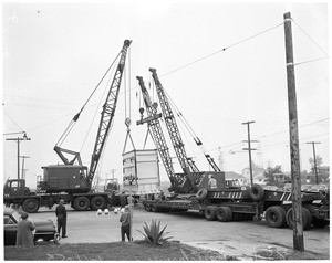 Big electric transformer moved, 1953