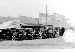 Cars in front of A. Lampson & Sons Garage