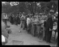 Boys in line for food at an aid station after the Long Beach earthquake, Southern California, 1933