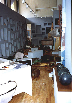 Inside a shop (possibly ID) after the earthquake