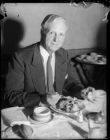 Senator Culbert L. Olson dines at a convention for the California Federation of Democratic Women's Clubs