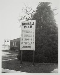 Sign board listing Santa Rosa Junior College football games for 1949