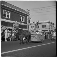 Horse and carriage bearing children marching in the post-war Labor day parade, Los Angeles, 1946