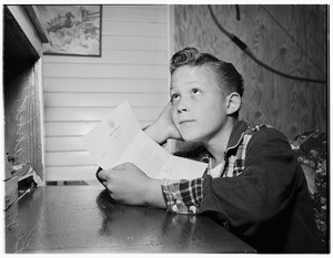 Boy letter writer, 1952