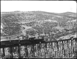 Atchison, Topeka and Santa Fe Railroad crossing a trestle in Arizona, ca.1895