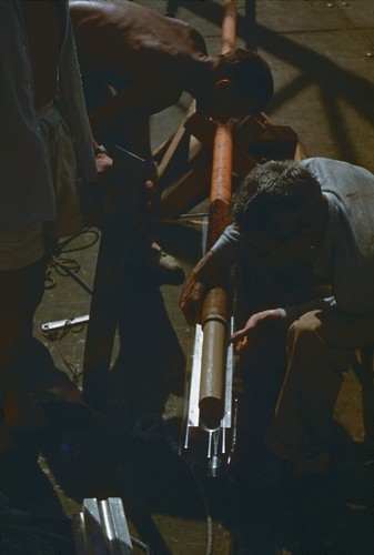 Milton Nunn Bramlette extracting core. Capricorn Expedition, 1952