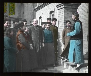 Fr. Anthony Cotta, MM, and a group of Chinese men and boys greet a priest, China, ca. 1906-1919