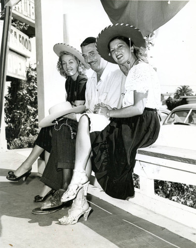 Paula Stone, Jimmy Wallington, and Ann Williams outside of the Malibu Inn, 1947