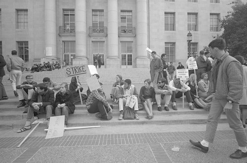 Picketers sitting on Sproul Steps