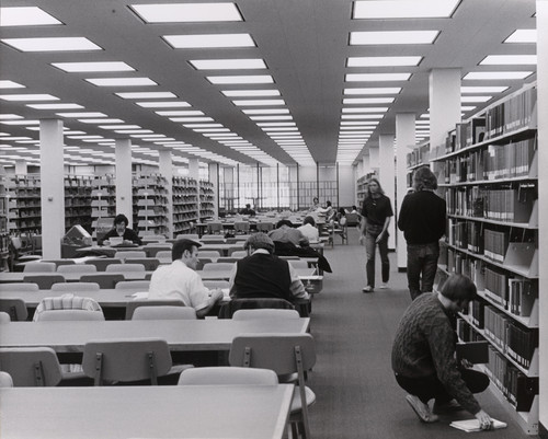 A photograph of the interior of the Library, likely in the southwestern corner of the Upper Mall