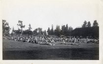 Stanford University students stretching on the football field