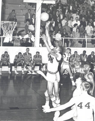 Jeff Cortwright and Woody Deitch on court during basketball game, Chapman College, Orange, California