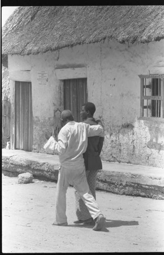 Two men in the street, San Basilio de Palenque, 1975