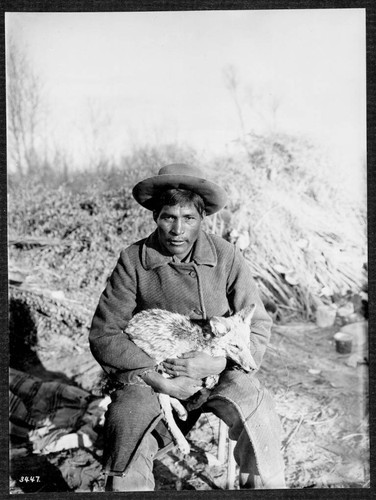 A Young Chemehuevi with Captured Coyote