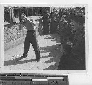 Chinese man preaching on a sidewalk at Shanghai, China, 1947