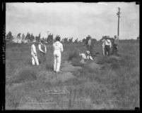 Prisoners digging for bones on Northcott Chicken Ranch in Riverside County, 1928-1929