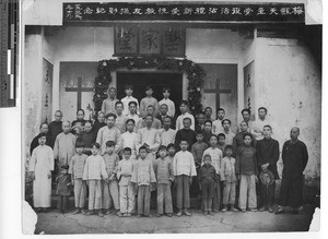 Chinese men and boys and women baptized at Meixien, China, 1935