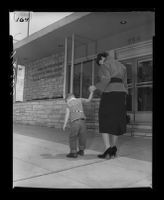 Mother takes child to the Los Angeles State Mental Hygiene Clinic, Los Angeles, 1955